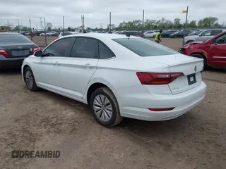 2019 Volkswagen Jetta S with VIN 3VWC57BUXKM059741, listed as a IAAI auction lot 42189565 with 127,972 mi miles and . Bid and sale history available at DreamBid. Image 3.