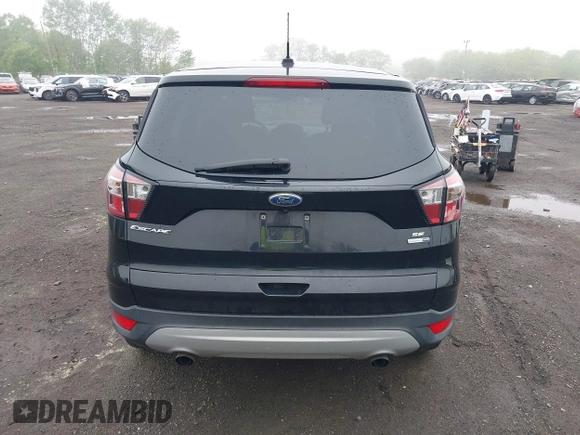 2017 Ford Escape SE with VIN 1FMCU9GD3HUD90154, listed as a IAAI auction lot 42181078 with 106,143 mi miles and . Bid and sale history available at DreamBid. Image 16.