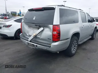 2010 Chevrolet Suburban LT with VIN 1GNUCJE03AR238548, listed as a IAAI auction lot 42104596 with 153,959 mi miles and . Bid and sale history available at DreamBid. Image 6.