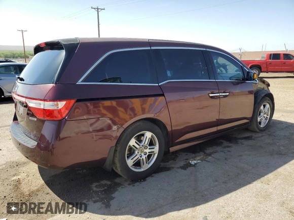 2012 Honda Odyssey Touring with VIN 5FNRL5H90CB076810, listed as a Copart auction lot 53124915 with 178,316 mi miles and Salvage Title. Bid and sale history available at DreamBid. Image 3.