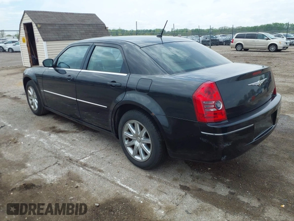 2008 Chrysler 300 Touring with VIN 2C3LA53G08H147012, listed as a IAAI auction lot 42109759 with 169,244 mi miles. Bid and sale history available at carsss.com. Image 3.