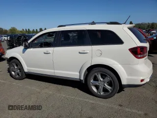 2017 Dodge Journey Crossroad Plus with VIN 3C4PDCGGXHT602670, listed as a Copart auction lot 54556675 with 179,702 mi miles and Salvage title. Bid and sale history available at DreamBid. Image 2.