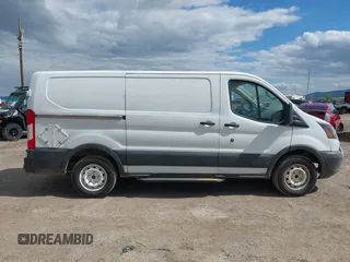 2015 Ford Transit Cargo z VIN 1FTNE1YM7FKB14241, wystawiony jako IAAI lot #42126200 z przebiegiem 314 744 mil mil oraz . Historia ofert i sprzedaży dostępna na DreamBid. Obrazek 14.