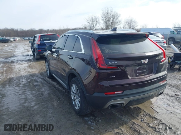 2020 Cadillac XT4 AWD Premium Luxury z VIN 1GYFZDR4XLF085471, wystawiony jako IAAI lot #41528080 z przebiegiem 58 136 mil mil oraz . Historia ofert i sprzedaży dostępna na DreamBid. Obrazek 3.