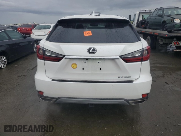 2022 Lexus RX 350 with VIN 2T2AZMDA5NC336823, listed as a Copart auction lot 86950954 with 38,959 mi miles and Salvage title. Bid and sale history available at DreamBid. Image 6.