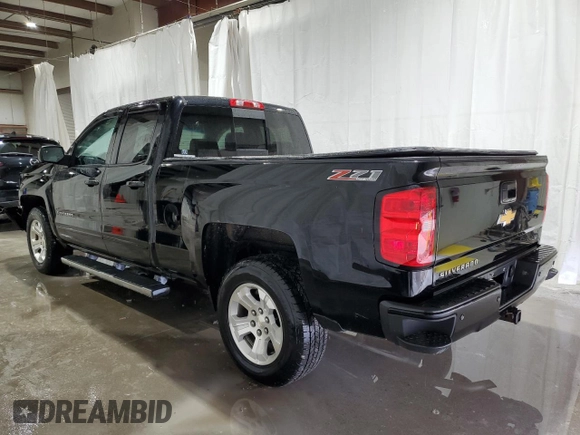 2017 Chevrolet Silverado 1500 LT with VIN 1GCVKREC0HZ141018, listed as a Copart auction lot 52708255 with 96,790 mi miles and Salvage Title. Bid and sale history available at DreamBid. Image 2.