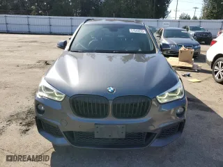 2016 BMW X1 xDrive28i with VIN WBXHT3C36G5E48019, listed as a Copart auction lot 51843235 with 95,711 mi miles and Salvage Title. Bid and sale history available at carsss.com. Image 5.