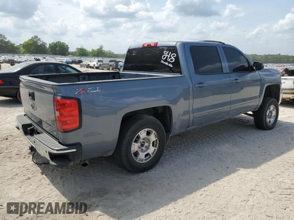 2015 Chevrolet Silverado 1500 LT with VIN 3GCUKREC2FG415389, listed as a Copart auction lot 53994135 with 148,655 mi miles and Salvage Title. Bid and sale history available at DreamBid. Image 3.