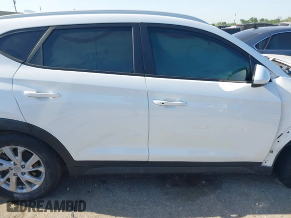 2021 Hyundai Tucson Value with VIN KM8J33A42MU314290, listed as a IAAI auction lot 41986298 with 32,740 mi miles and . Bid and sale history available at DreamBid. Image 14.