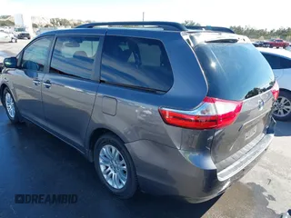2016 Toyota Sienna XLE with VIN 5TDYK3DC7GS721667, listed as a IAAI auction lot 41400702 with 85,188 mi miles and . Bid and sale history available at DreamBid. Image 3.