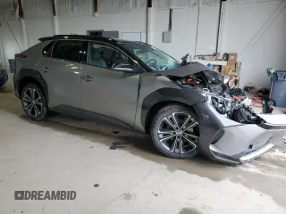 2024 Toyota bZ4X XLE with VIN JTMAAAAA1RA046054, listed as a Copart auction lot 53476515 with Not Provided miles and Salvage Title. Bid and sale history available at DreamBid. Image 4.