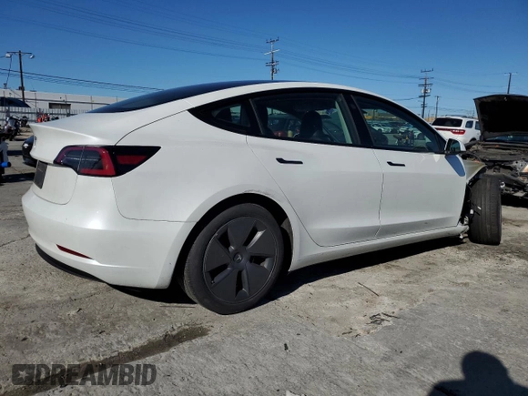 2023 Tesla Model 3 with VIN 5YJ3E1EA7PF557358, listed as a Copart auction lot 48891985 with 20,673 mi miles and Salvage title. Bid and sale history available at DreamBid. Image 3.