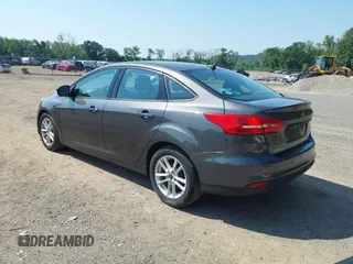 2015 Ford Focus SE with VIN 1FADP3F25FL300945, listed as a IAAI auction lot 42483699 with 76,992 mi miles and . Bid and sale history available at DreamBid. Image 3.