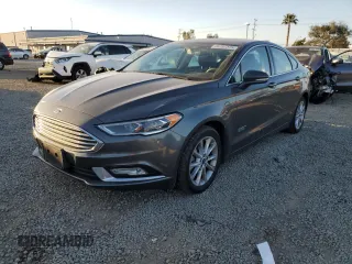 2017 Ford Fusion Energi SE with VIN 3FA6P0PU7HR306029, listed as a Copart auction lot 46787375 with 112,276 mi miles and Salvage Title. Bid and sale history available at carsss.com. Image 1.