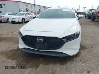 2021 Mazda 3 Premium with VIN JM1BPAML0M1302385, listed as a IAAI auction lot 41397521 with 55,907 mi miles and . Bid and sale history available at DreamBid. Image 11.