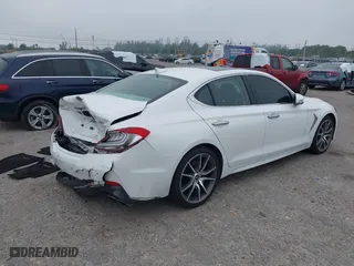2020 Genesis G70 2.0T with VIN KMTG44LA8LU064798, listed as a IAAI auction lot 41878098 with 57,995 mi miles. Bid and sale history available at carsss.com. Image 4.
