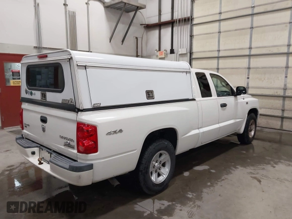 2009 Dodge Dakota Bighorn/Lonestar with VIN 1D3HW32P79S819674, listed as a IAAI auction lot 41962369 with 157,399 mi miles and . Bid and sale history available at carsss.com. Image 4.
