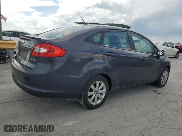 2012 Ford Fiesta SE z VIN 3FADP4BJ8CM194262, wystawiony jako Copart lot #56685845 z przebiegiem 367 579 mil mil oraz Szkoda całkowita • Salvage title. Historia ofert i sprzedaży dostępna na DreamBid. Obrazek 3.