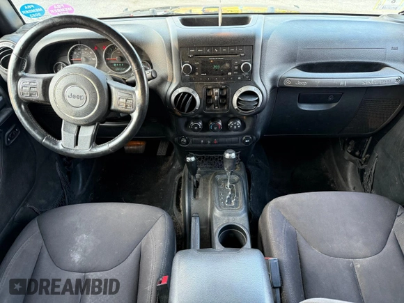 2015 Jeep Wrangler Unlimited Sport with VIN 1C4BJWDG8FL502570, listed as a Copart auction lot 65854505 with 120,541 mi miles and Clean title. Bid and sale history available at DreamBid. Image 9.