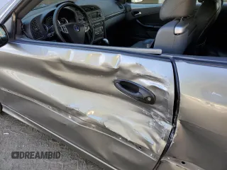 2004 Saab 9-3 z VIN YS3FH79Y646010094, wystawiony jako Copart lot #72316434 z przebiegiem 134 445 mil mil oraz Szkoda całkowita • Salvage title. Historia ofert i sprzedaży dostępna na DreamBid. Obrazek 7.