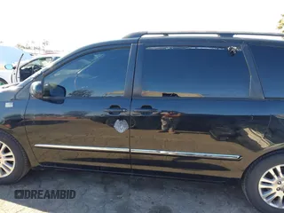 2009 Toyota Sienna XLE with VIN 5TDZK22C69S273555, listed as a IAAI auction lot 41276221 with 129,160 mi miles and . Bid and sale history available at DreamBid. Image 14.