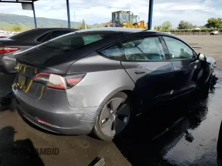 2023 Tesla Model 3 with VIN 5YJ3E1EA0PF449499, listed as a Copart auction lot 52900515 with 42,706 mi miles and Non Repairable. Bid and sale history available at DreamBid. Image 3.
