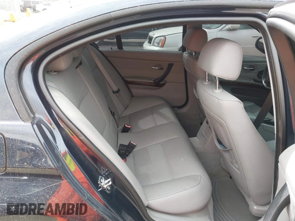 2009 BMW 3 Series 328i with VIN WBAPH77549NM30399, listed as a IAAI auction lot 41837955 with 82,610 mi miles. Bid and sale history available at carsss.com. Image 8.