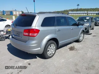 2018 Dodge Journey SE z VIN 3C4PDCAB8JT344720, wystawiony jako IAAI lot #40491703 z przebiegiem 86 601 mil mil oraz . Historia ofert i sprzedaży dostępna na DreamBid. Obrazek 4.
