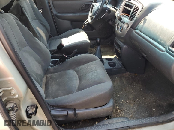 2004 Mazda Tribute DX with VIN 4F2YZ02B74KM13874, listed as a Copart auction lot 65422864 with 288,215 mi miles and Salvage Title. Bid and sale history available at carsss.com. Image 11.