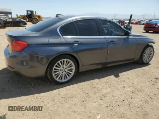 2013 BMW 3 Series 328i with VIN WBA3C1C56DF437440, listed as a Copart auction lot 61389475 with 122,736 mi miles and Salvage title. Bid and sale history available at DreamBid. Image 3.