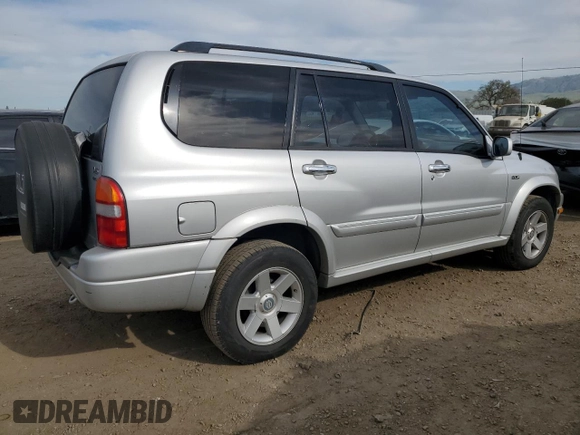 2003 Suzuki XL7 Touring z VIN JS3TX92V934111781, wystawiony jako Copart lot #47422395 z przebiegiem 248 137 mil mil oraz Czysty tytuł • Clean title. Historia ofert i sprzedaży dostępna na DreamBid. Obrazek 3.