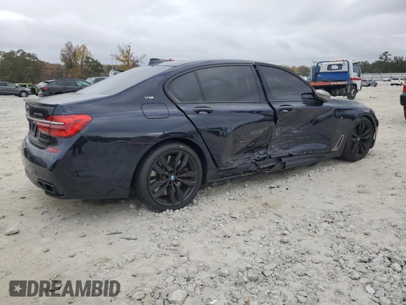 2019 BMW 7 Series M760i xDrive with VIN WBA7H6C51KG615276, listed as a Copart auction lot 79597234 with 39,195 mi miles and Salvage Title. Bid and sale history available at carsss.com. Image 3.