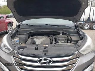 2013 Hyundai Santa Fe Sport z VIN 5XYZU3LA4DG085412, wystawiony jako IAAI lot #42016302 z przebiegiem 121 484 mil mil oraz . Historia ofert i sprzedaży dostępna na DreamBid. Obrazek 10.