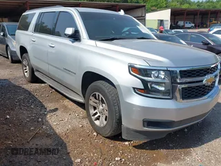 2016 Chevrolet Suburban LT z VIN 1GNSCHKC8GR138646, wystawiony jako IAAI lot #42375589 z przebiegiem 167 797 mil mil oraz . Historia ofert i sprzedaży dostępna na DreamBid. Obrazek 1.