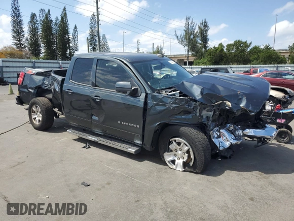 2018 Chevrolet Silverado 1500 LT with VIN 1GCRCREH5JZ261185, listed as a Copart auction lot 51847875 with 103,082 mi miles and Salvage Title. Bid and sale history available at DreamBid. Image 4.