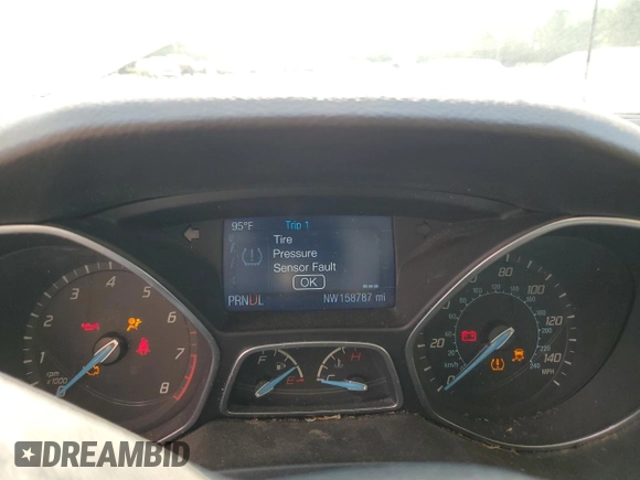 2014 Ford Focus SE z VIN 1FADP3K24EL345833, wystawiony jako Copart lot #57307075 z przebiegiem 158 787 mil mil oraz Szkoda całkowita • Salvage title. Historia ofert i sprzedaży dostępna na DreamBid. Obrazek 9.