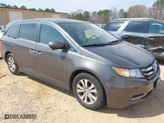 2016 Honda Odyssey EX-L with VIN 5FNRL5H61GB099699, listed as a IAAI auction lot 41807964 with 67,041 mi miles. Bid and sale history available at carsss.com. Image 1.