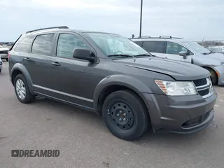 2017 Dodge Journey SE z VIN 3C4PDCAB3HT552417, wystawiony jako IAAI lot #40867584 z przebiegiem 127 211 mil mil oraz . Historia ofert i sprzedaży dostępna na DreamBid. Obrazek 1.