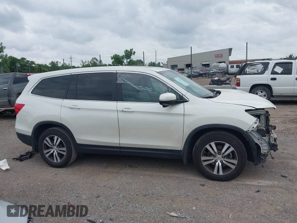 2018 Honda Pilot EX-L with VIN 5FNYF5H55JB016471, listed as a IAAI auction lot 42397519 with 102,482 mi miles and . Bid and sale history available at DreamBid. Image 14.