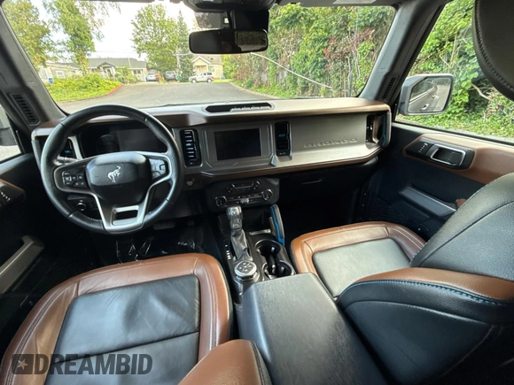 2022 Ford Bronco with VIN 1FMEE5DP5NLB24049, listed as a Copart auction lot 56769875 with 20,710 mi miles and Salvage Title. Bid and sale history available at DreamBid. Image 9.