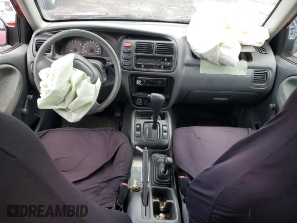 2000 Suzuki Vitara JX z VIN 2S3TD52V9Y6100173, wystawiony jako Copart lot #86200824 z przebiegiem Nie podano mil oraz Szkody całkowita. Historia ofert i sprzedaży dostępna na DreamBid. Obrazek 8.