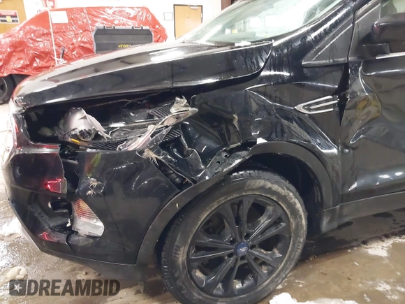 2018 Ford Escape SE with VIN 1FMCU9GD7JUD36295, listed as a IAAI auction lot 41855037 with 85,305 mi miles. Bid and sale history available at carsss.com. Image 17.