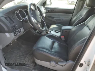 2014 Toyota Tacoma with VIN 3TMLU4EN7EM144839, listed as a Copart auction lot 52728065 with 32,610 mi miles and Salvage Title. Bid and sale history available at DreamBid. Image 7.