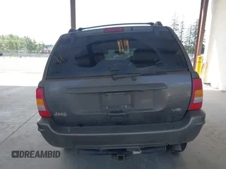 1999 Jeep Grand Cherokee Limited z VIN 1J4GW68N0XC512229, wystawiony jako IAAI lot #42189815 z przebiegiem 230 028 mil mil oraz . Historia ofert i sprzedaży dostępna na DreamBid. Obrazek 17.