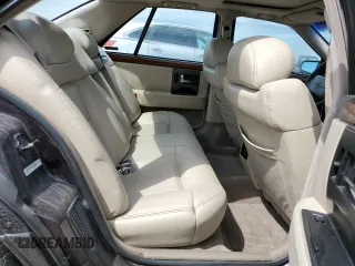 1992 Cadillac Seville z VIN 1G6KY53BXNU804126, wystawiony jako Copart lot #69219394 z przebiegiem 100 647 mil mil oraz Czysty tytuł • Clean title. Historia ofert i sprzedaży dostępna na DreamBid. Obrazek 10.