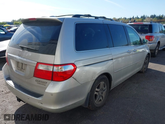2005 Honda Odyssey TOURING with VIN 5FNRL38855B069043, listed as a IAAI auction lot 42035153 with 236,533 mi miles. Bid and sale history available at carsss.com. Image 6.