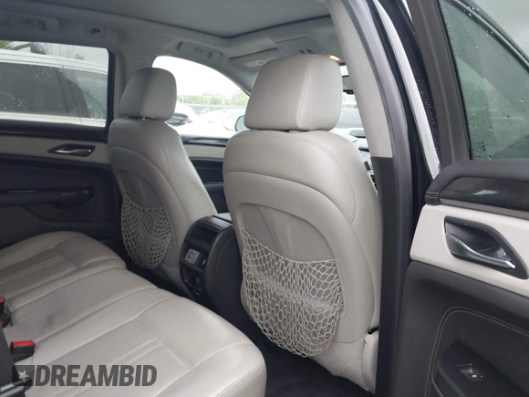 2016 Cadillac SRX Performance Collection with VIN 3GYFNCE31GS578010, listed as a IAAI auction lot 42346383 with 89,118 mi miles and . Bid and sale history available at DreamBid. Image 8.