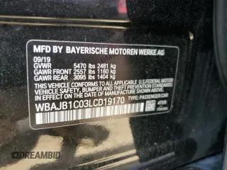 2020 BMW 5 Series with VIN WBAJB1C03LCD19170, listed as a Copart auction lot 64942594 with 66,584 mi miles and Salvage title. Bid and sale history available at DreamBid. Image 12.