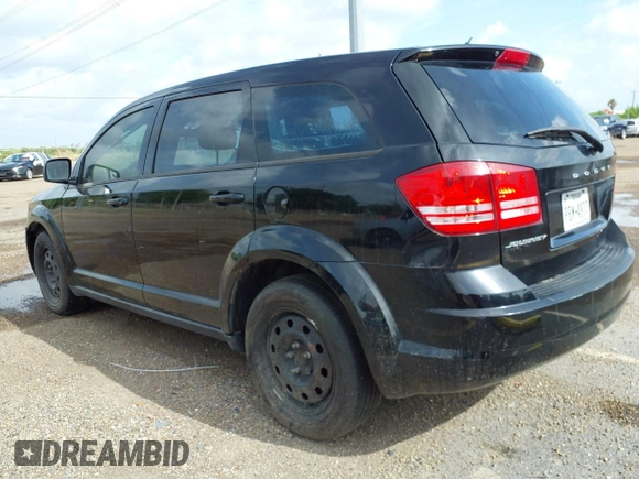 2014 Dodge Journey SE with VIN 3C4PDCAB7ET116651, listed as a IAAI auction lot 42762513 with 197,808 mi miles and . Bid and sale history available at DreamBid. Image 3.