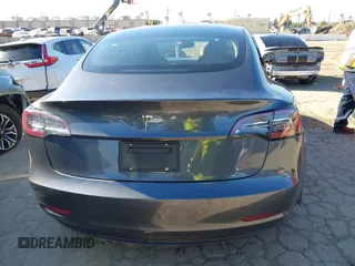 2022 Tesla Model 3 with VIN 5YJ3E1EA3NF165054, listed as a IAAI auction lot 41805729 with 225,773 mi miles. Bid and sale history available at carsss.com. Image 15.